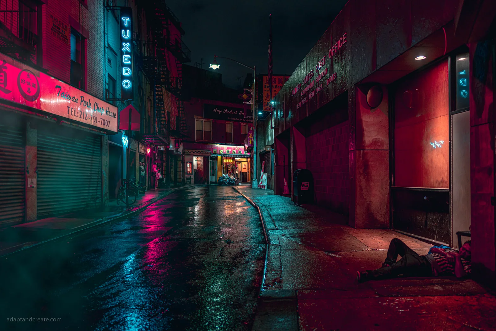 Red and cyan signs illuminate a wet city alley, with a reclining figure beside the sidewalk.